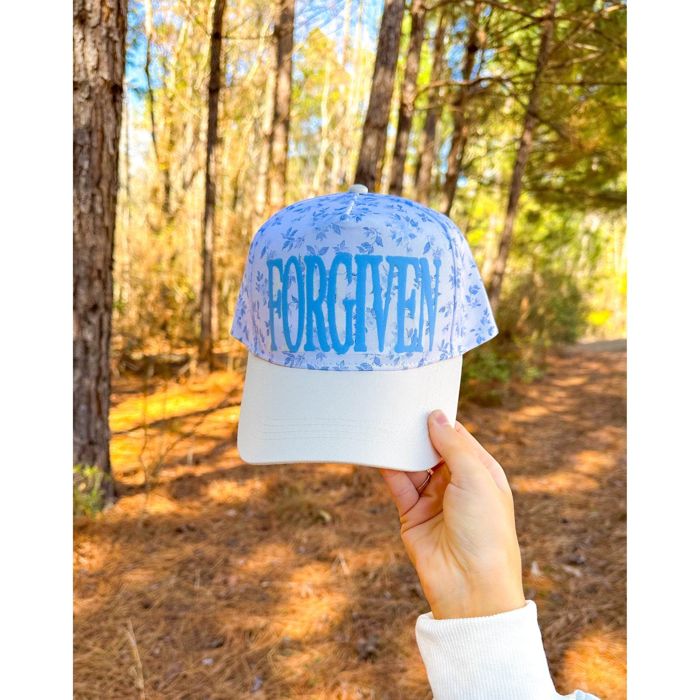 FORGIVEN Floral White/Light Blue Trucker Hat - The Hive by Chris Jesselle